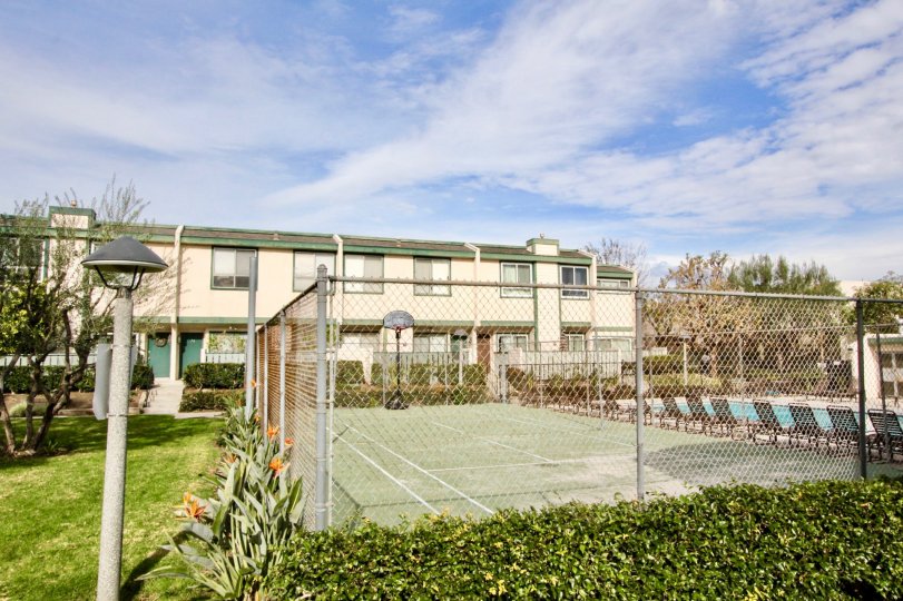 The basketball court in Park Terrace Village on a cloudy day