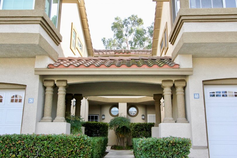 A walkway with hedges in Casafina in Rancho Santa Margarita, CA