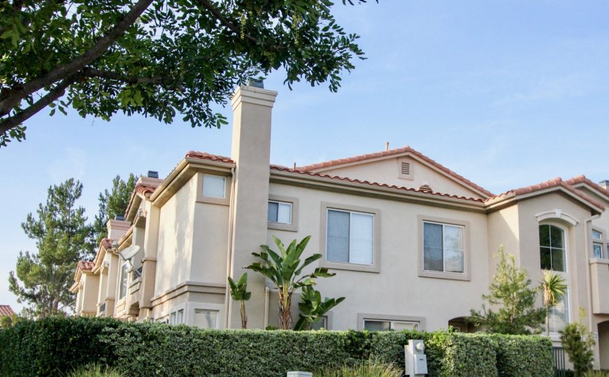 Hedges and apartment in La Ventana in Rancho Santa Margarita, CA