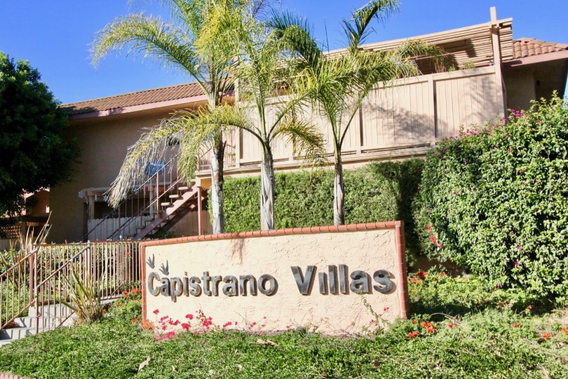 Trees and sign in Capistrano Villas in San Juan Capistrano, CA