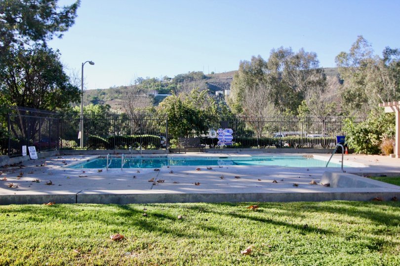 A view of the pool on a sunny day in Capistrano Villas.