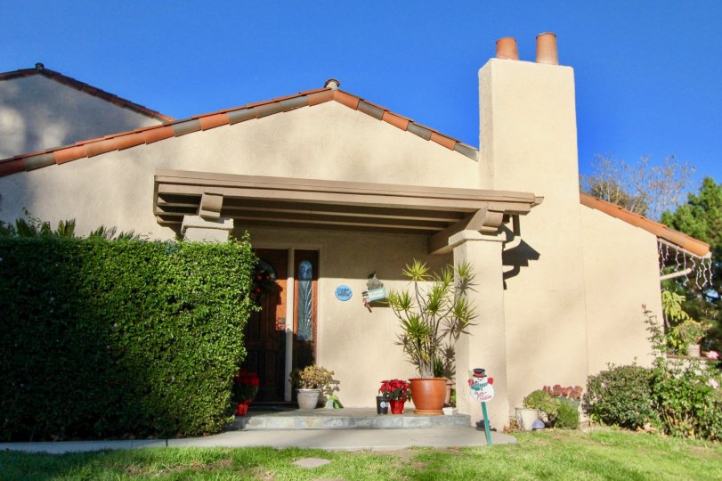 The entrance to a home with hedge and nice plantings in the Captains Hill area of San Juan Capistrano, California