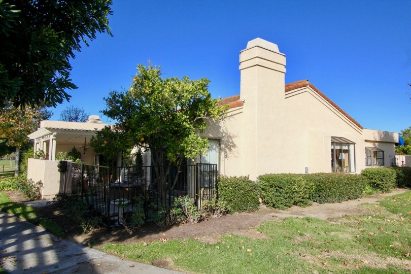 Housing in San Juan Capistrano, California. Community of Mesa Verde. Fenced in garden to relax.