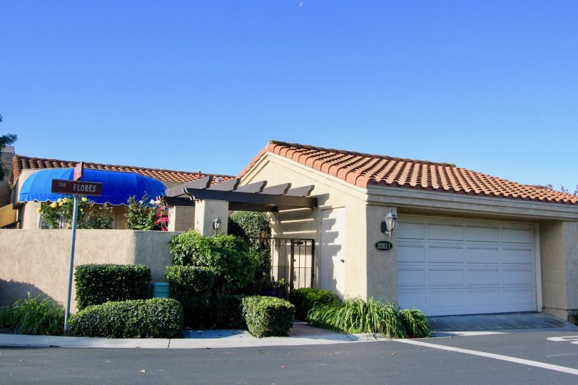 Home located at 32011 Via Flores in the Mesa Verde neighborhood with plenty of landscaping