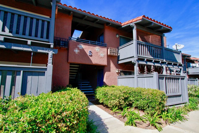 Exterior of the Monterey Villas building on a sunny day in Santa Ana, California