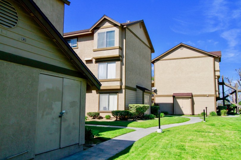 A large lawn area running along large villas inside Westerly Park community