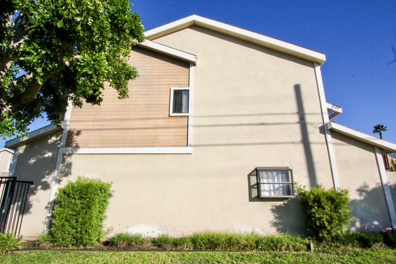Side view of two story home in Alida Gardens community of Stanton California