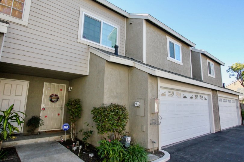 A huge building with grey color walls and glass windows and slanting roof in Western Meadows.