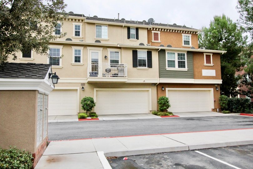 An overcast day in the Camden Place apartments complete with garages and walking areas