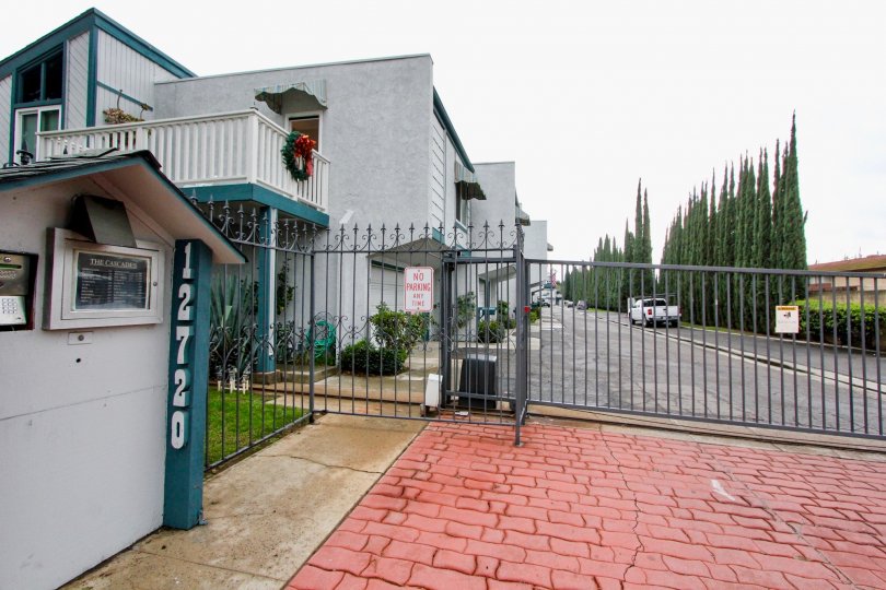 THE 12720 VILLAS IN THE CASCADES WITH THE CAR PARKING, PLANTS, TREES
