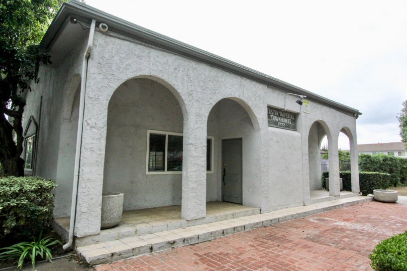 Nice view of a villa with small corridor and trees beside in Tustin Imperial of Tustin