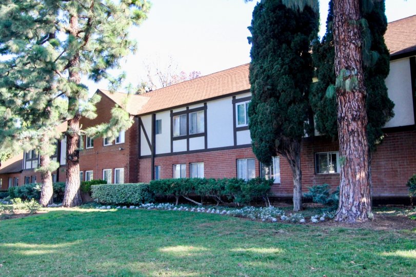 A two-storey townhouse with brick cladding in the Williamshire Condos neighborhood.