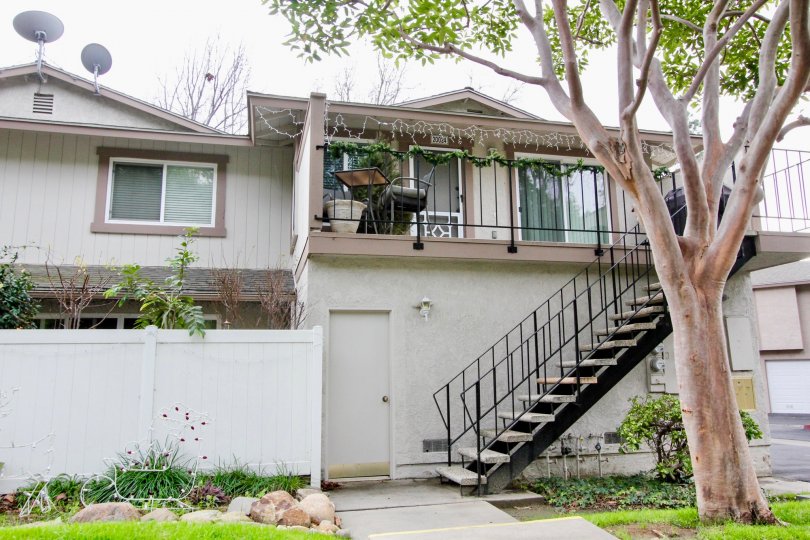 A day in the Fairmont Hill in front of a house with stairs.
