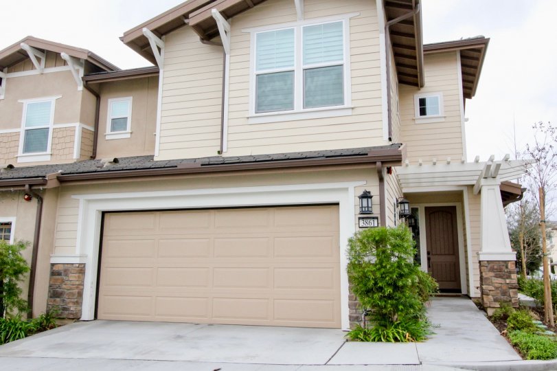 Palisades at Vista Del Verde Yorba Linda California with big walls and small front door side