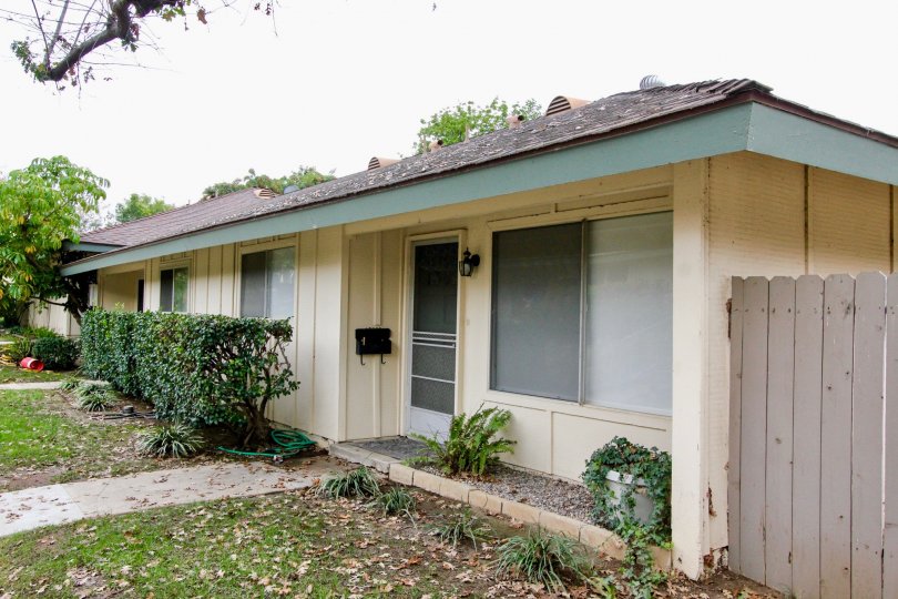 white homes with plants outfront with walkway in rancho linda community in yorba linda, california.