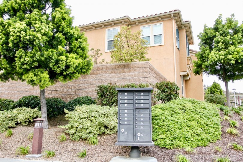 Villaggio Yorba Linda California like hill station building with thick trees and iron box models in front