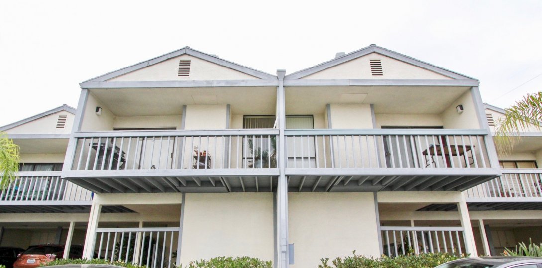 In Balcony of villa to Golf View Terrace has benches and car is parking