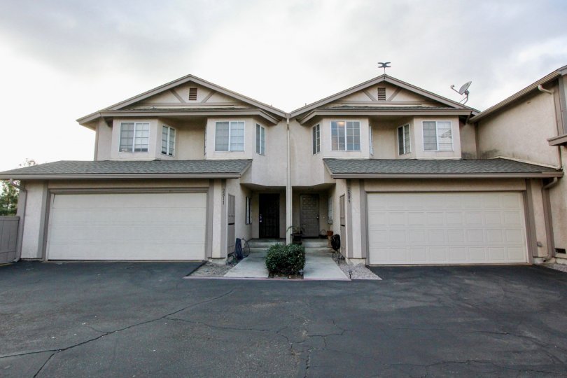 Two homes, two garages, and two driveways in Hescon Heights