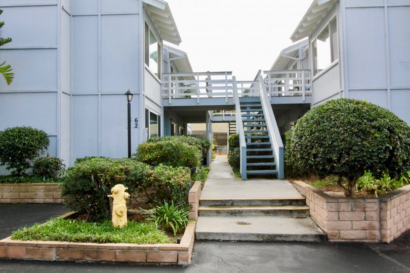 A view between two sets of buildings at LAguna De Los Patos in Carlsbad California