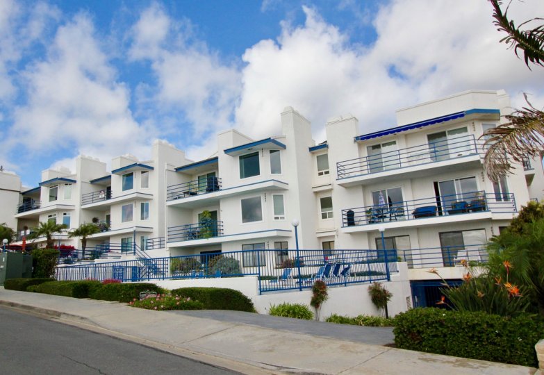 Nice view of villas with balconies and garden in front in Llewellyn Shores of Carlsbad