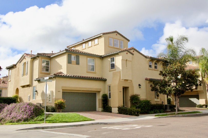 Villa having beautiful lawn and trees in front in Mystic Point of Carlsbad