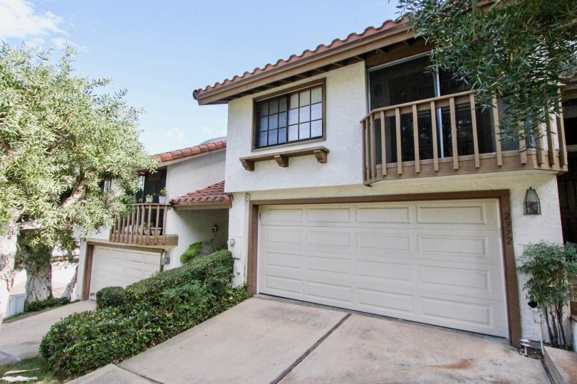 A blue sky above a town home in Villa La Costa located in Carlsbad CA