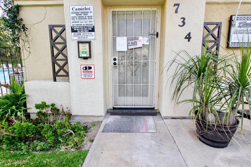 Front entrance of the building 734 have a board CLOSED in Camelot