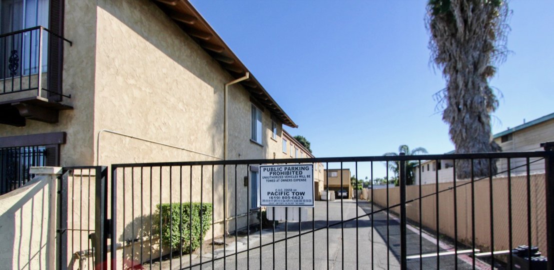 THE APARTMENT IN THE CASA DE MOSS WITH THE PUBLIC PARKING PROHIBITED BOARD