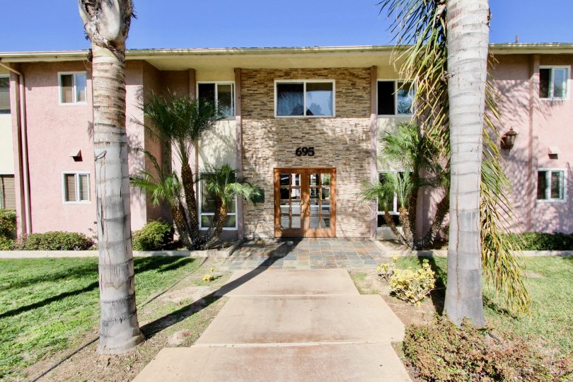 A Beautiful House with Lawn in front with trees in Las Palmas