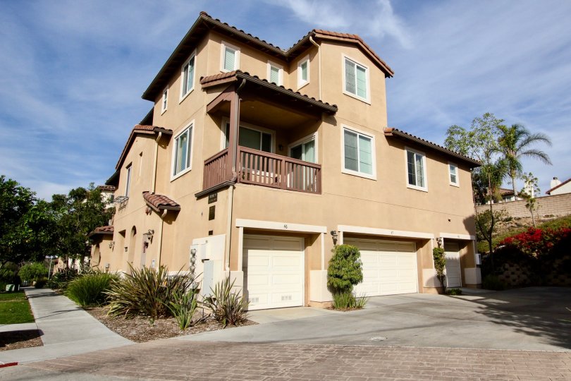 Exterior view of garages and balcony at Mar Brisa in Chula Vista, CA