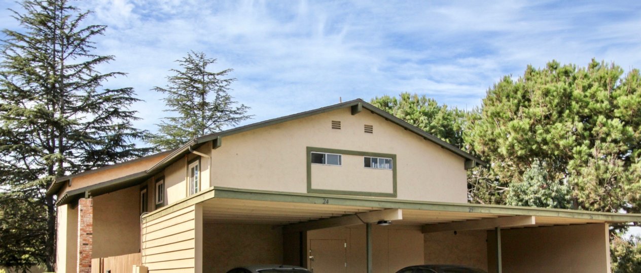 Two small vents sit above two windows on the Melrose Place Townhomes conods