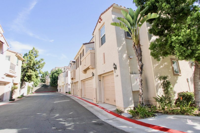 Many white color garage buildings in the Silver Sage neighborhood.