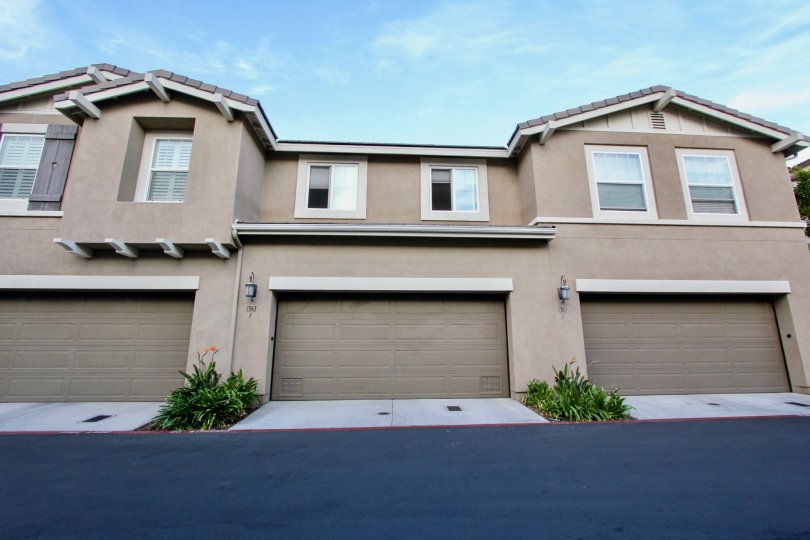 A brown house with garages in the Eastlake Summit community