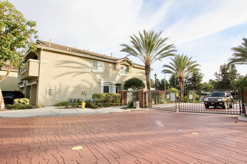 A brick courtyard just inside the gates of a Willow Bend community