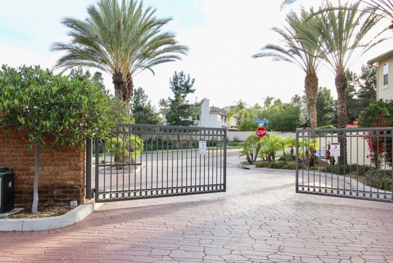 A gated entryway to the Willow Bend community with a well-paved road.