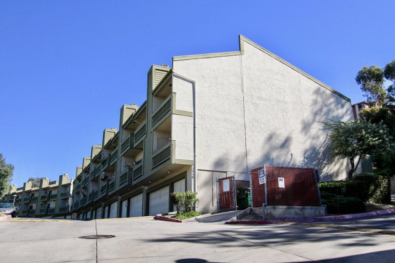 The street leads up to the building of College Park Townhomes in California.