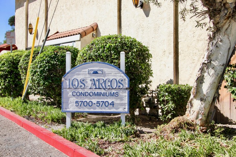 The Los Arcos with name board in the front side and lots of greenary around