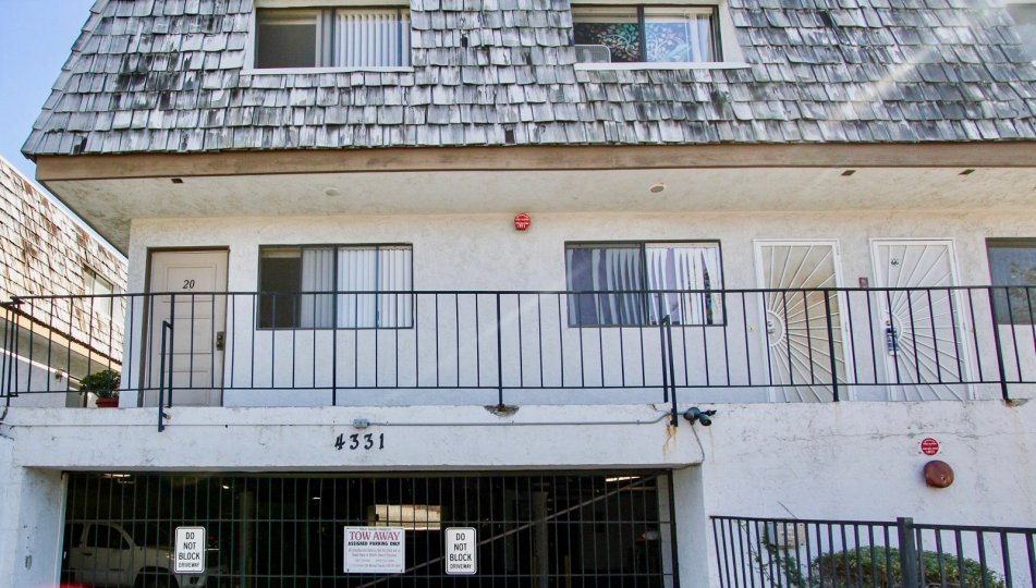 Multiple story housing with underground parking at Mediterranean Villas in College Area California