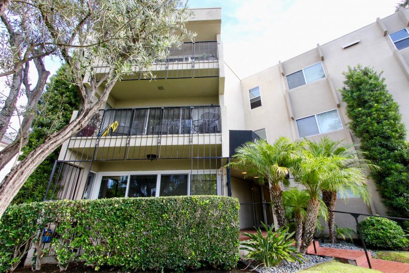 Star Park Condos Coronado California large building with apartments and garden