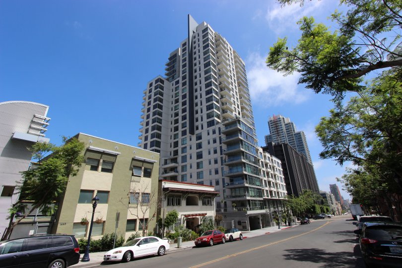 Tall building against a clear, blue sky in the Aria community of Downtown San Diego, California