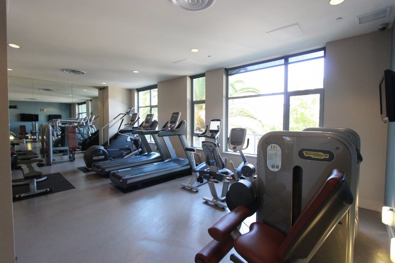 Two treadmills, and stationary bikes look out over the city at Aria.