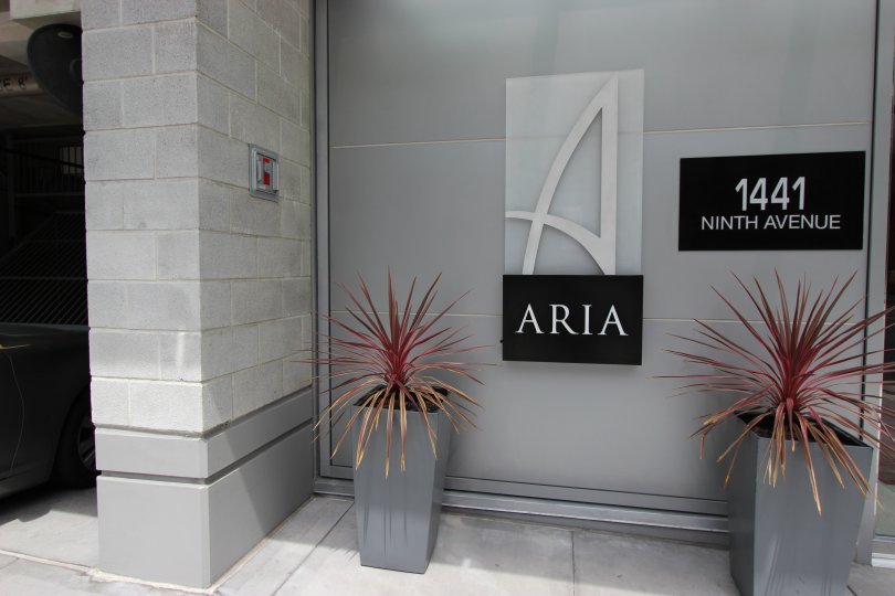 Black and gray sign in the lobby of Aria in Downtown San Diego CA