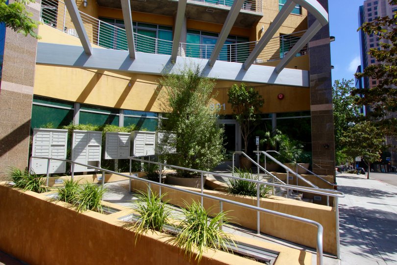 Vegetation and a sidewalk by the stairs leading to Cortez Blu in downtown San Diego, CA