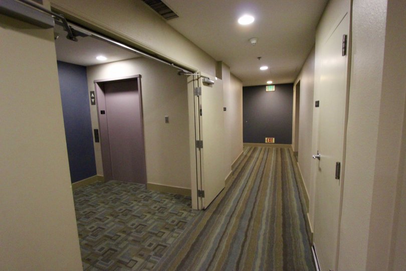 Interior hall way with elevator in the Diamond Terrace community in downtown San Diego, CA