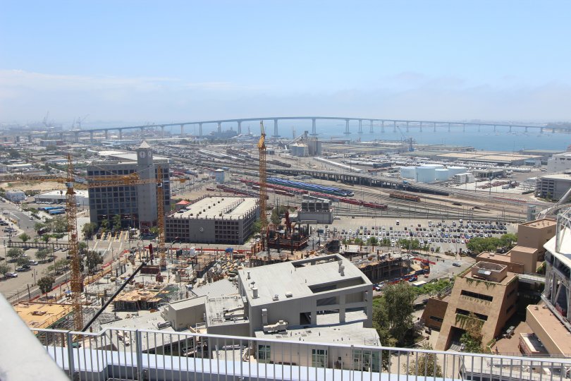 A bridge half hidden in fog is visible from the terrace at Icon conodos
