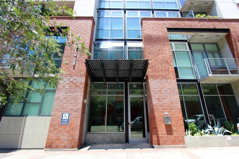Brick building with many glass windows at M2i in Downtown San Diego Ca