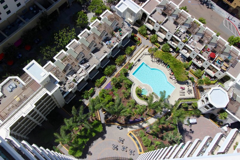 An aerial view is shown over a Park Place community pool.