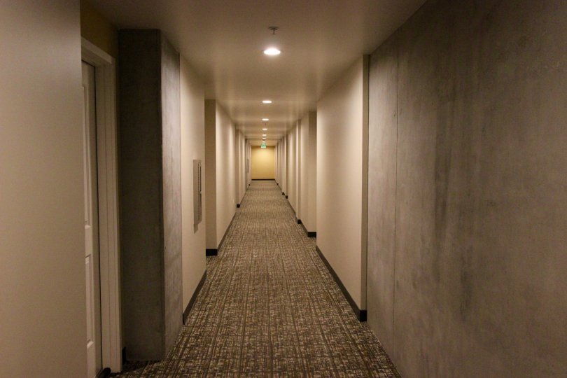Hallway with recessed lighting and carpet in the Smart Corner community