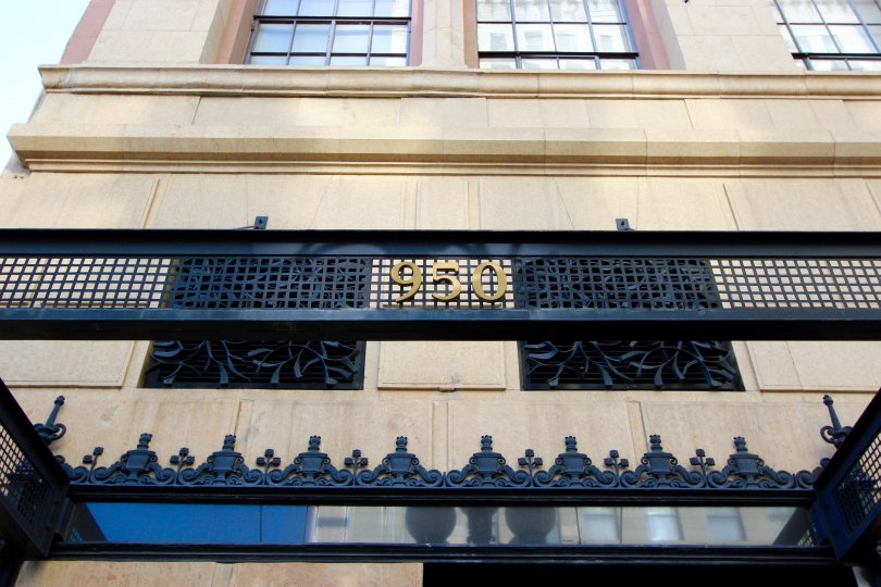 A building with address numbers 950 and metal gate in Union Square Downtown San Diego CA.