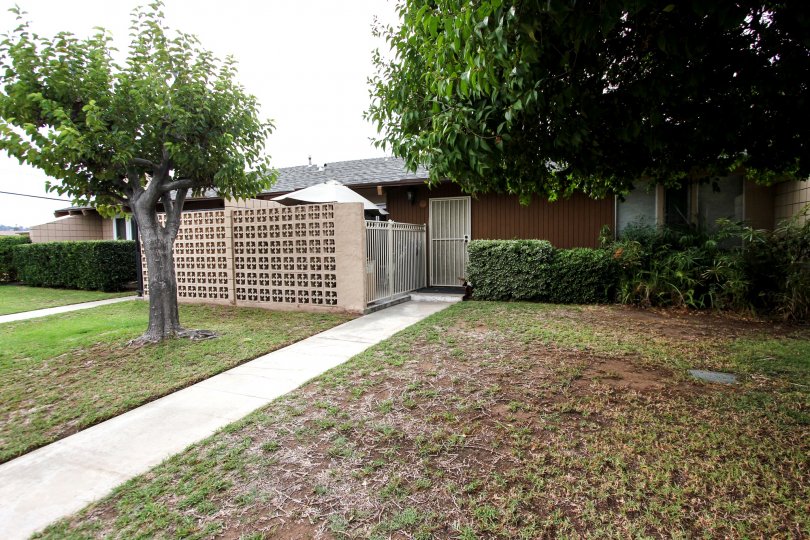 VERY BEAUTIFUL HOUSE. IN FRONT OF IT THERE IS A LAWN. GREENERY IS EVERY WHERE.
